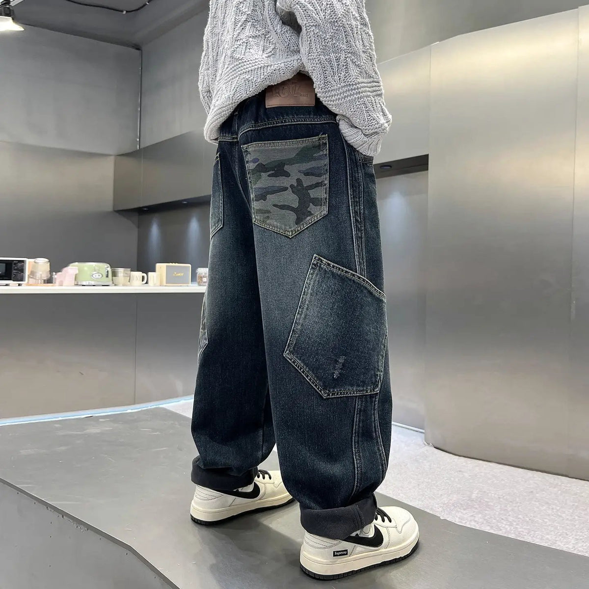 Boys casual denim jeans by eprolo with a loose straight leg, dark wash and camo back pocket patch