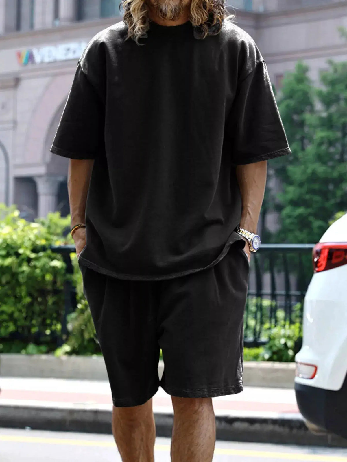 Men's black relaxed-fit T-shirt and shorts set with pockets, 2-piece ensemble