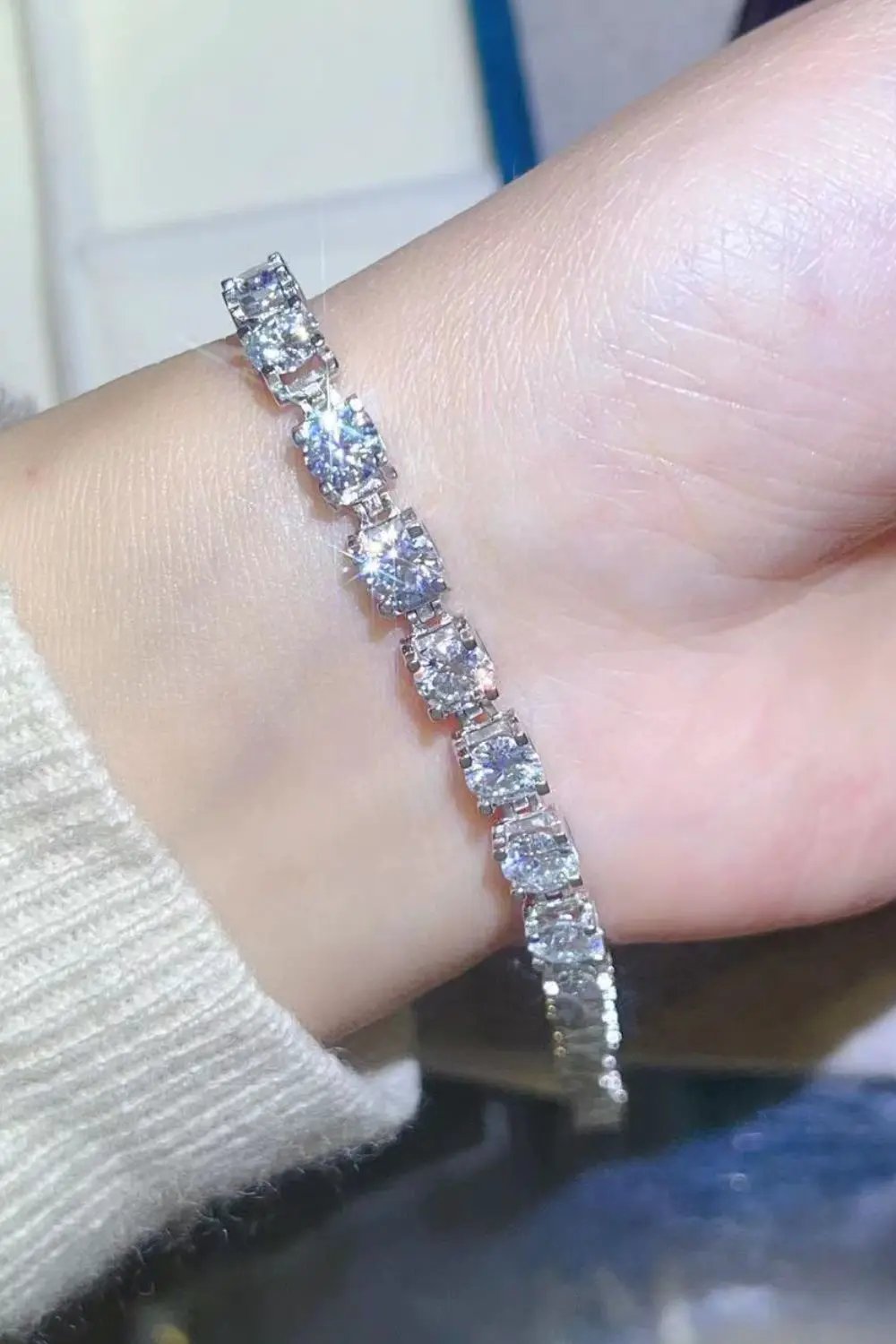 Bracelet: 10 Carat Moissanite platinum-plated band with square-cut stones