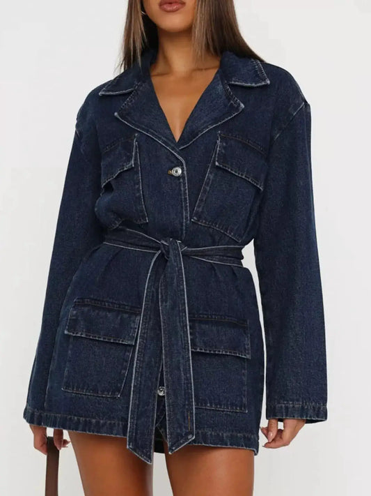 Longline washed denim jacket with matching belt in dark indigo denim; front pockets and wide lapels.