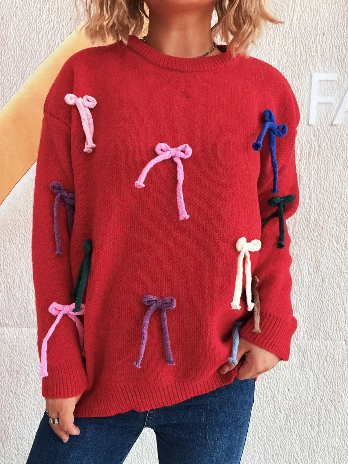 Vibrant bow-accent red round-neck knit sweater for women with multicolor bows by Trendsi