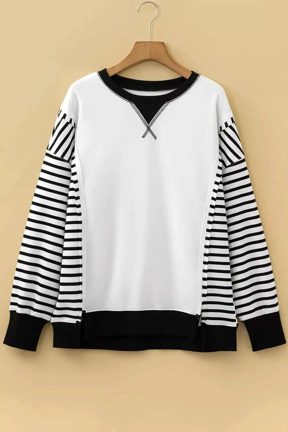 Sweatshirt with white front and black-striped sleeves, black ribbed collar, color-block design, cotton blend, Trendsi