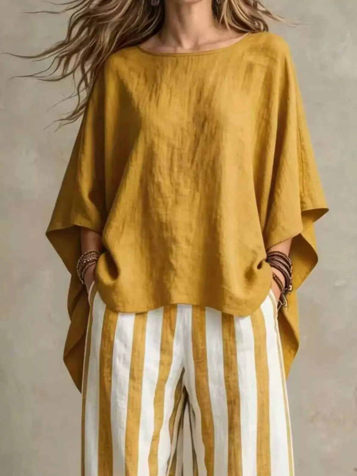 Plus-size mustard-yellow top with batwing sleeves and striped pants set