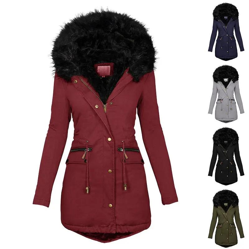 Women's plush hooded parka in burgundy with black faux-fur trim, mid-length zip-front coat with buckle pockets.