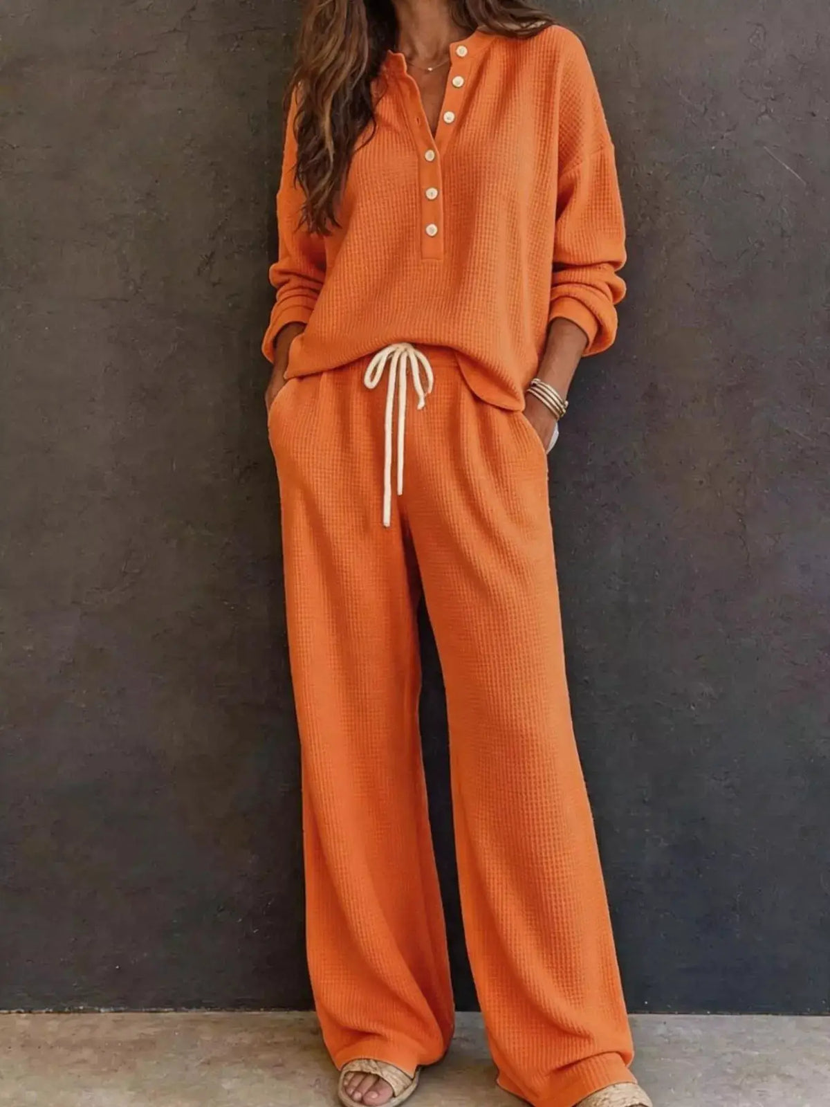 Waffle-knit Henley Top and Wide-Leg Pants Set in orange with white button placket and drawstring waist