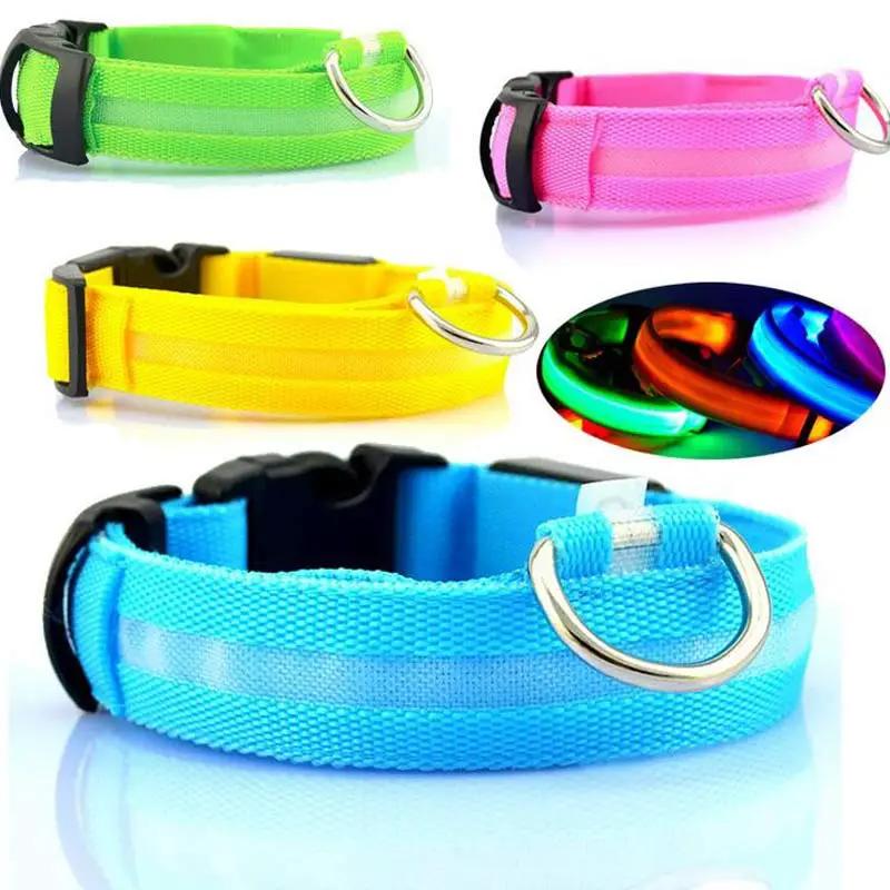 Set of four nylon LED pet collars in bright green, pink, yellow, and blue with D-ring hardware