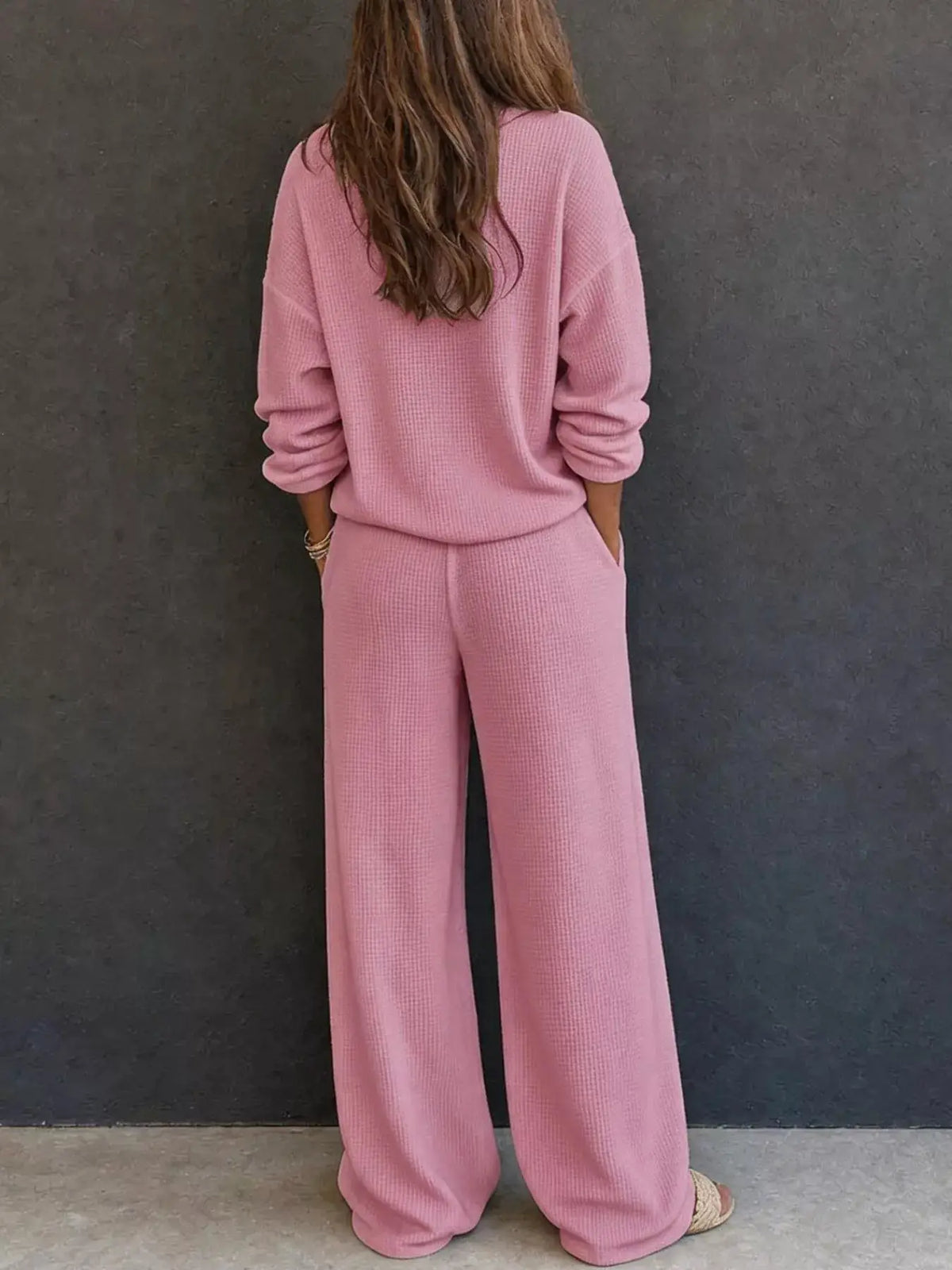 Waffle-knit henley top and wide-leg pants set in pink by Trendsi.