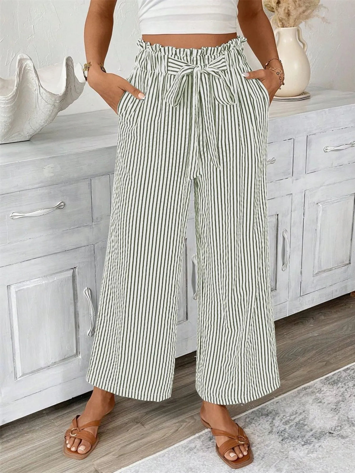 Plus-size white-striped wide-leg palazzo pants with paper-bag waist, tie belt and pockets