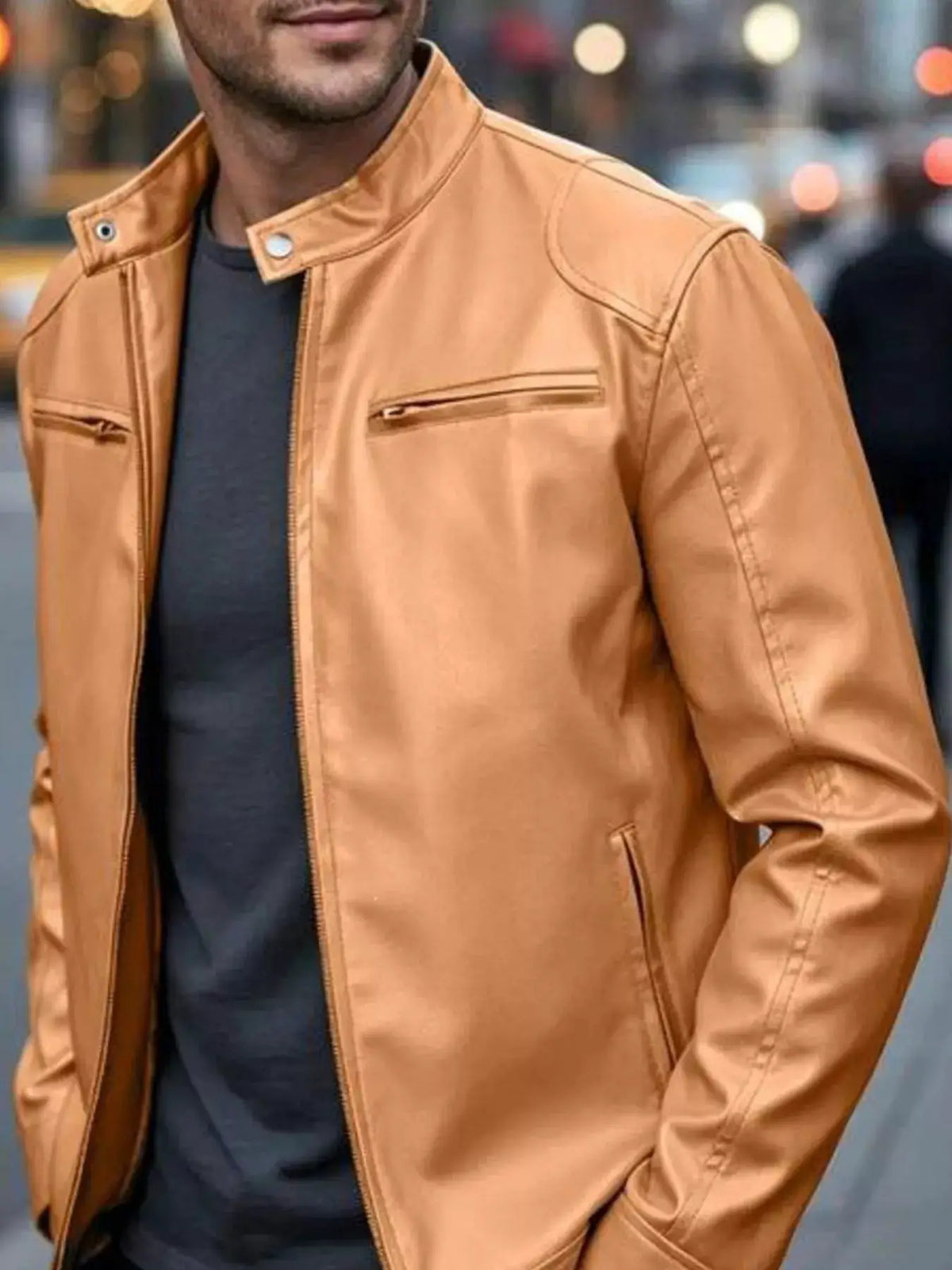 Men's full-size faux leather bomber jacket in tan with zip pockets and snap stand collar