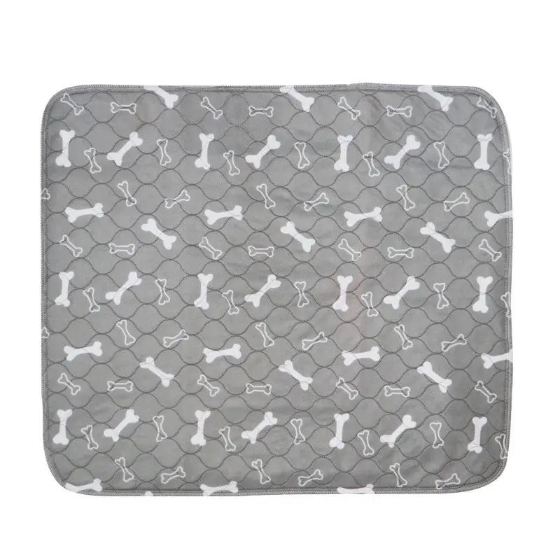 Three-layer waterproof pet absorbent pad by AdTec, square gray with bone pattern.