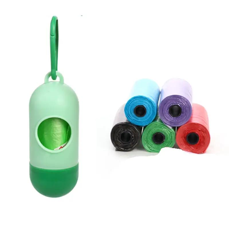 AdTec green dog poop bag dispenser with multicolor rolled bags.