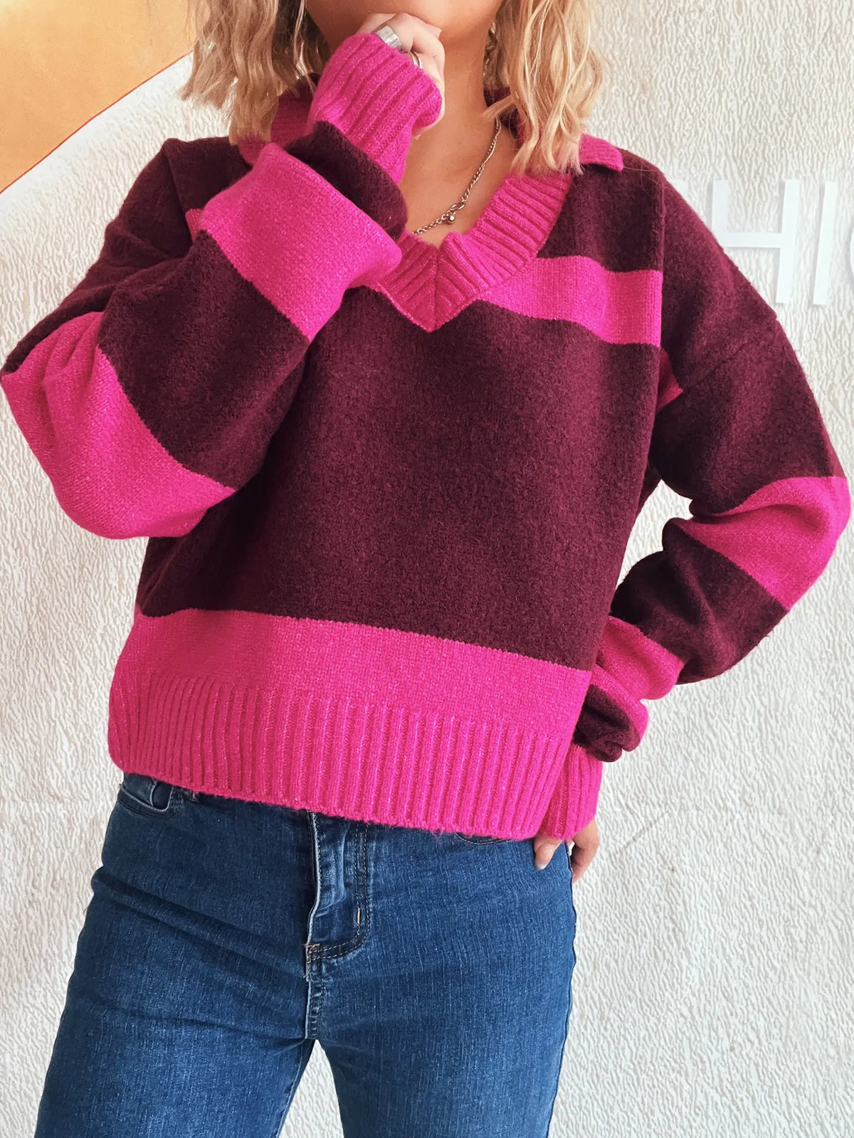 Color-block long-sleeve sweater in pink and burgundy with a soft stretch polyester blend