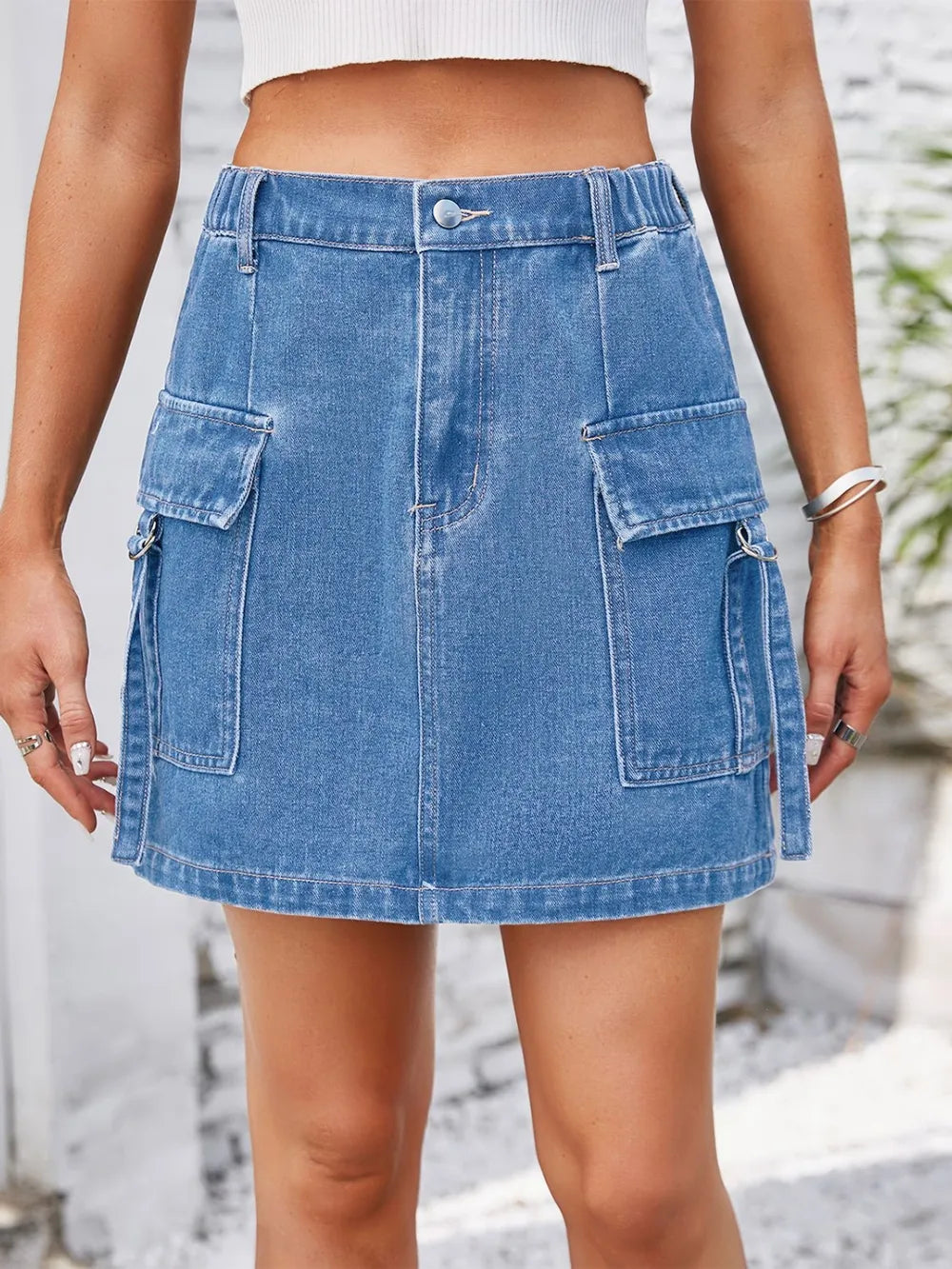 Pocketed Buttoned Denim Skirt in blue with side cargo pockets