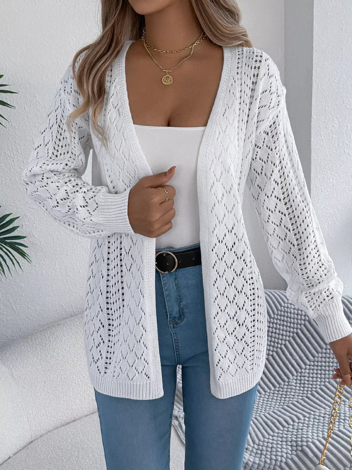 Openwork long-sleeve cardigan in white with diamond-knit pattern and open-front stretch knit.