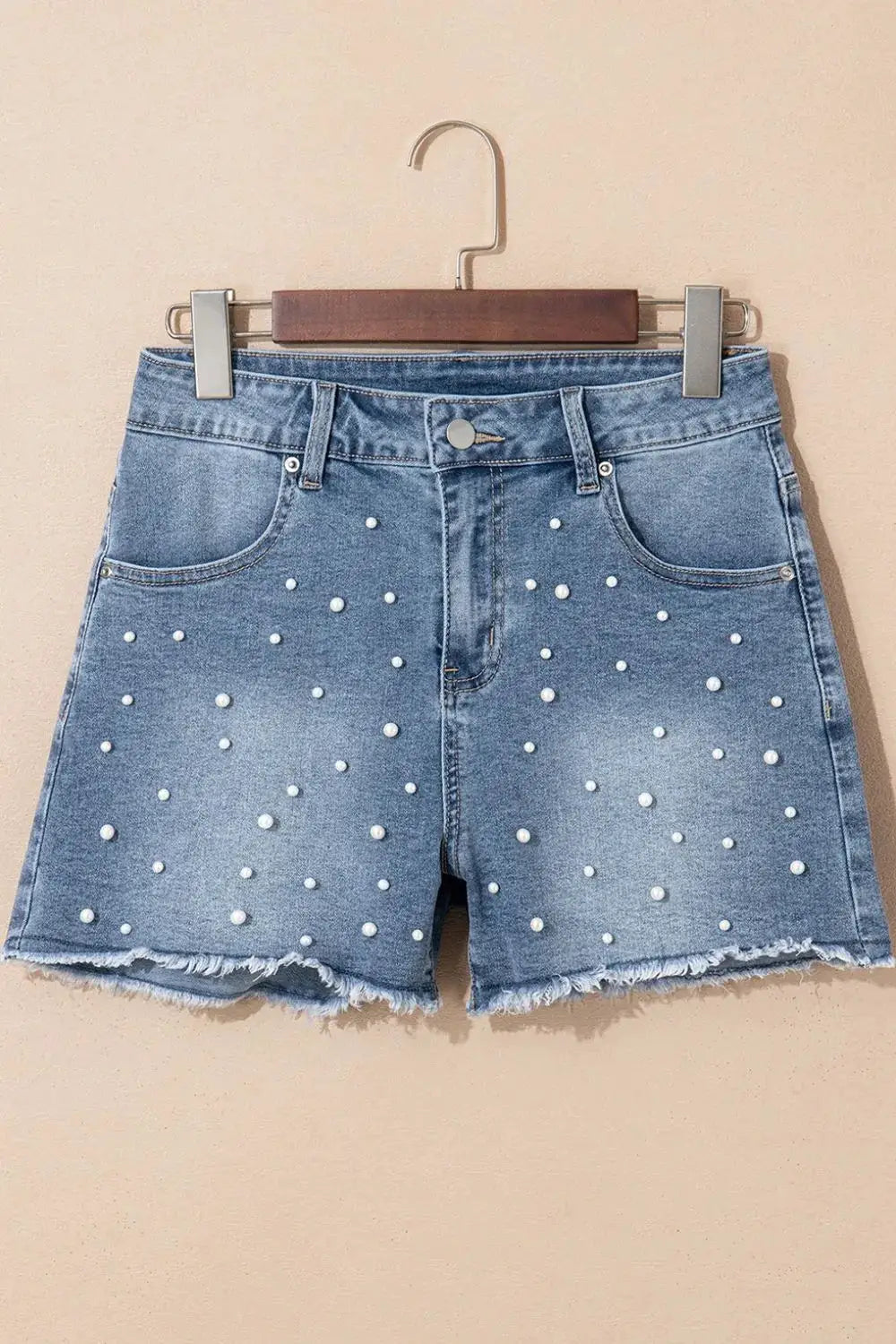 Classic pearl-beaded denim shorts with a raw frayed hem in washed cotton blend by Trendsi.