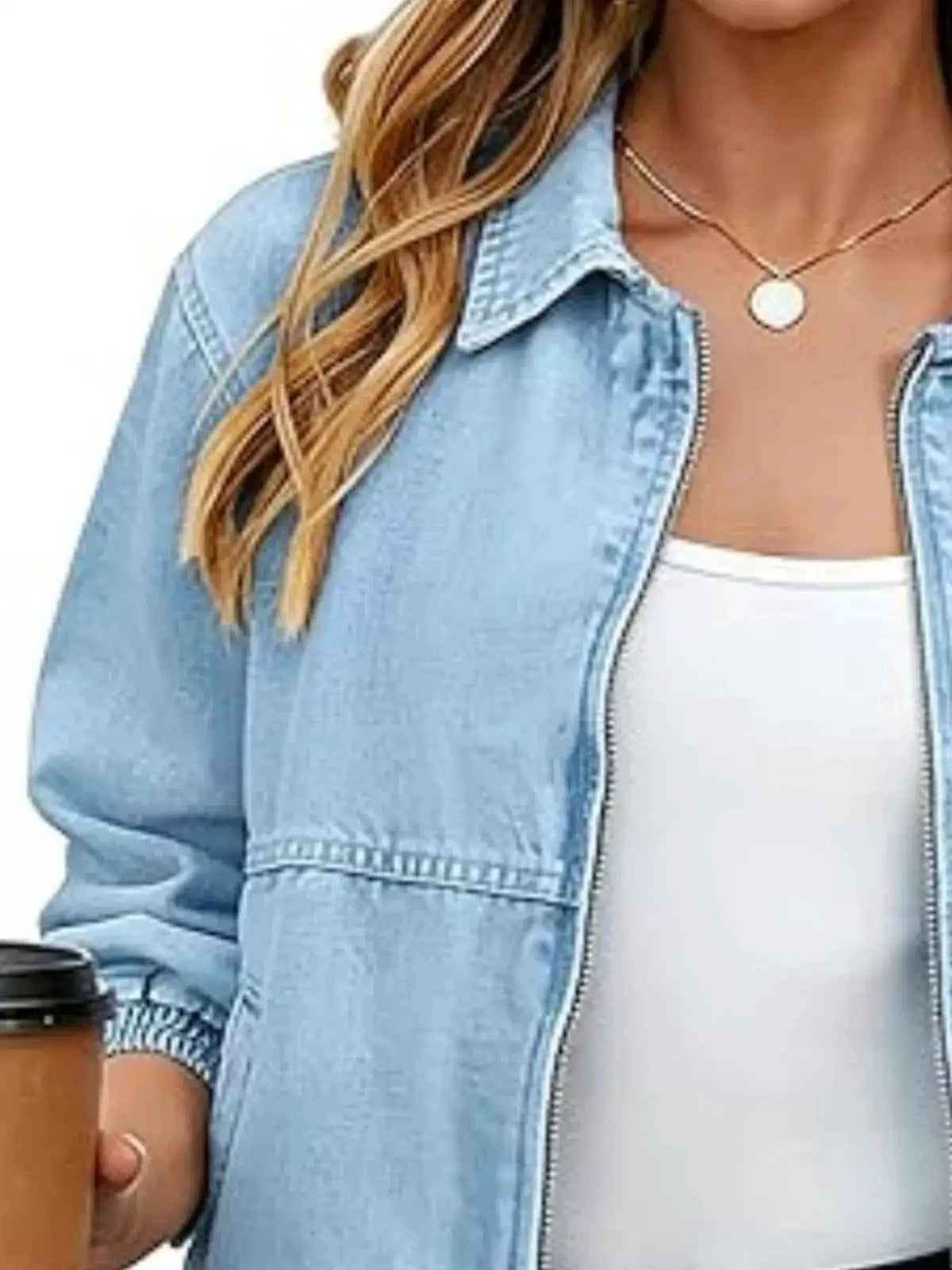 Denim jacket, light-wash, zip-up with comfortable stretch worn by a person.