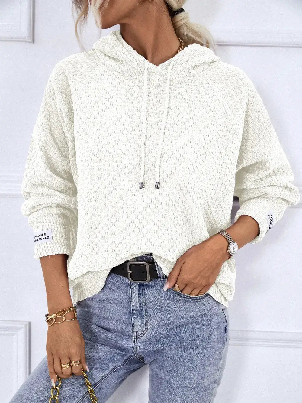 Textured white drawstring hoodie sweater, long sleeves, premium polyester.