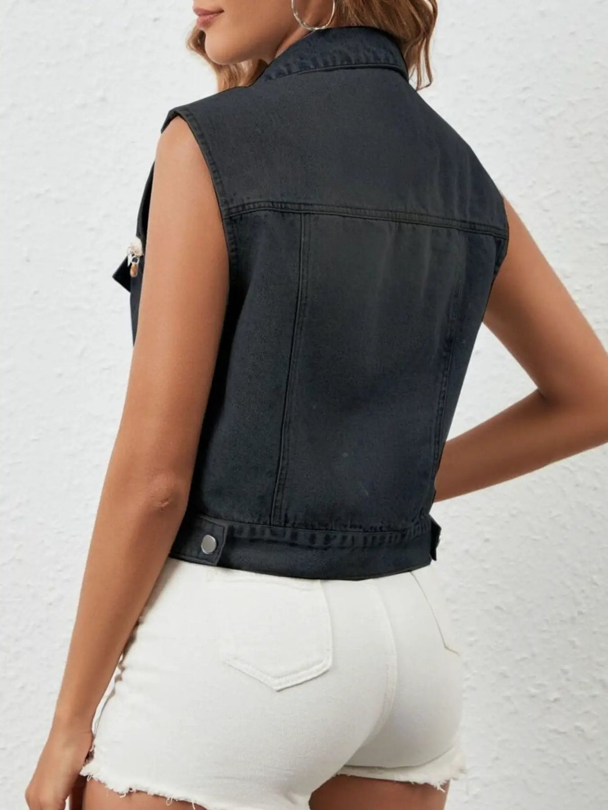 Gentle Drape rayon button-up layering top by Trendsi in black, sleeveless with structured back.