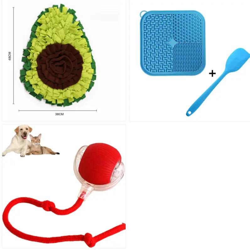 3-item pet grooming set: green circular steam brush, blue silicone grooming mat with spatula, red ball toy with rope
