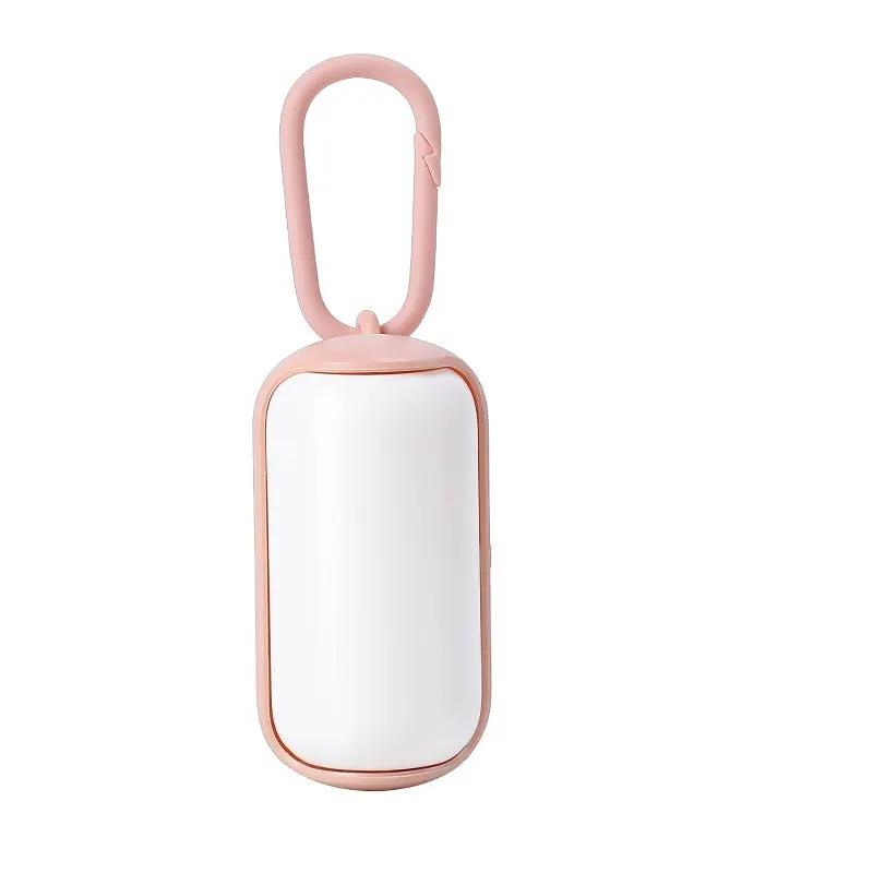 AdTec pink portable poop bag dispenser for cats and dogs with clip-on carrier