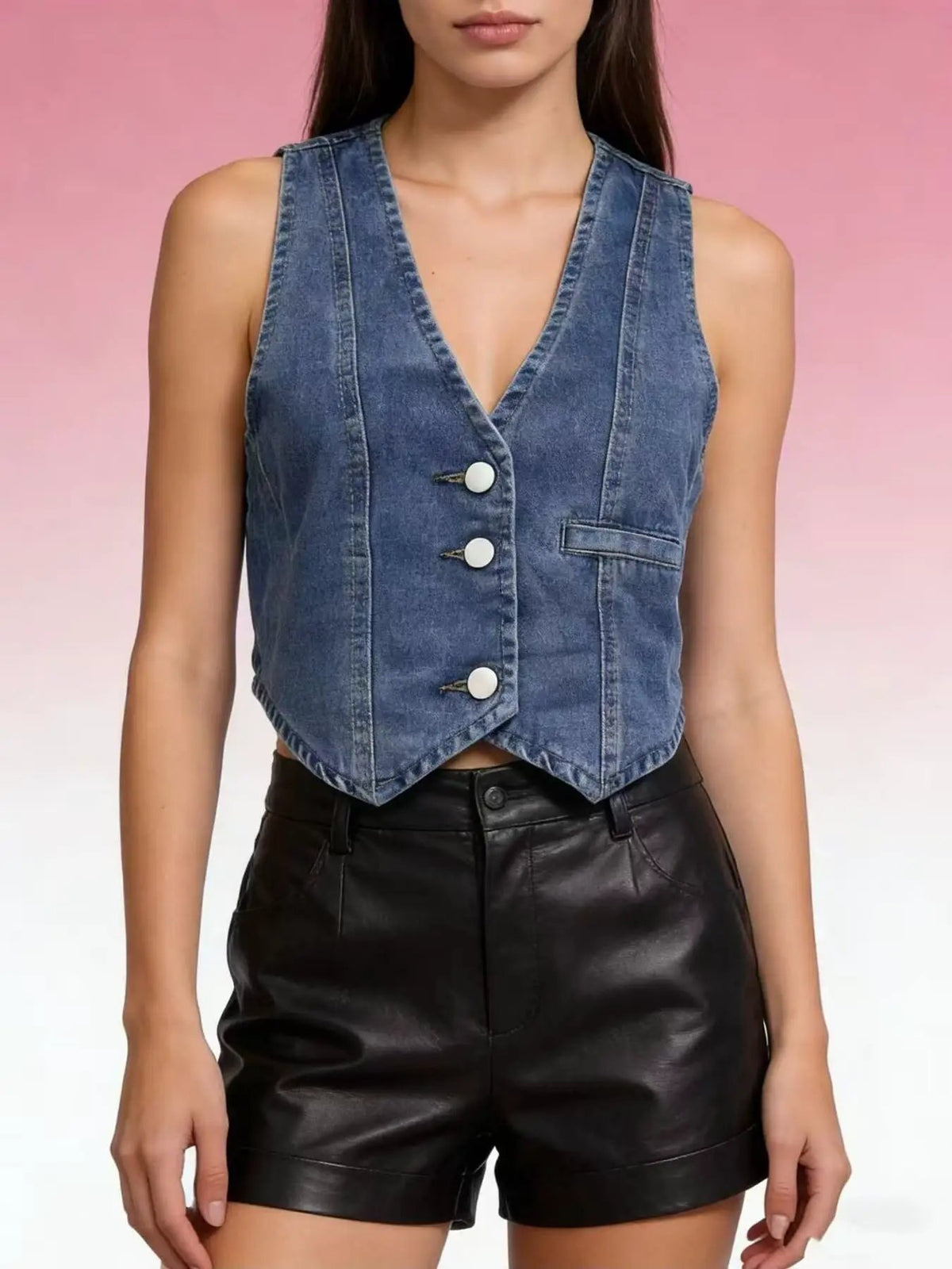 Denim vest, unlined with front white buttons, cropped sleeveless fit in light blue wash