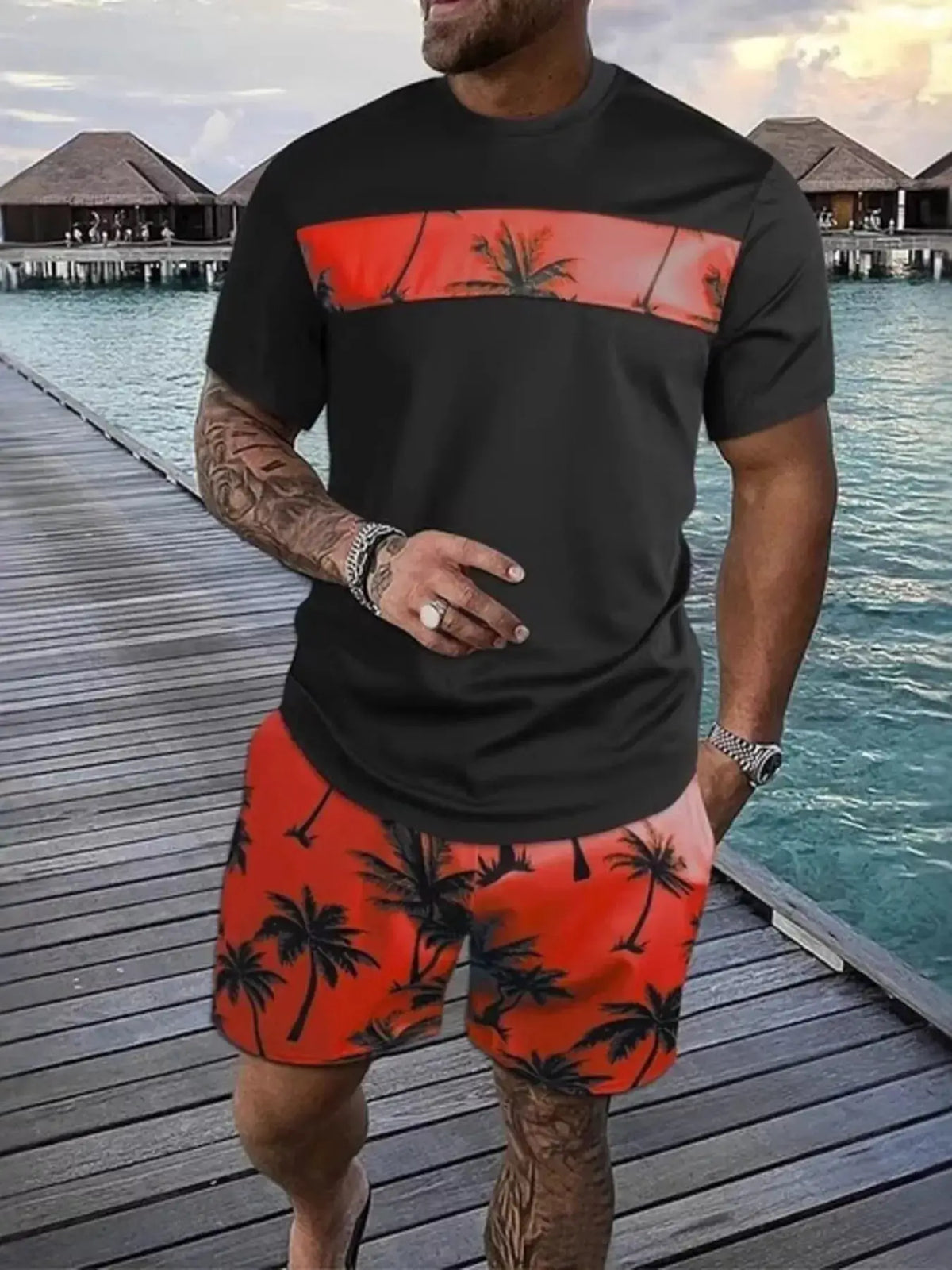 Mens tropical palm-tree tee and shorts set; black tee with orange palm-band and orange palm-print shorts (two-piece)