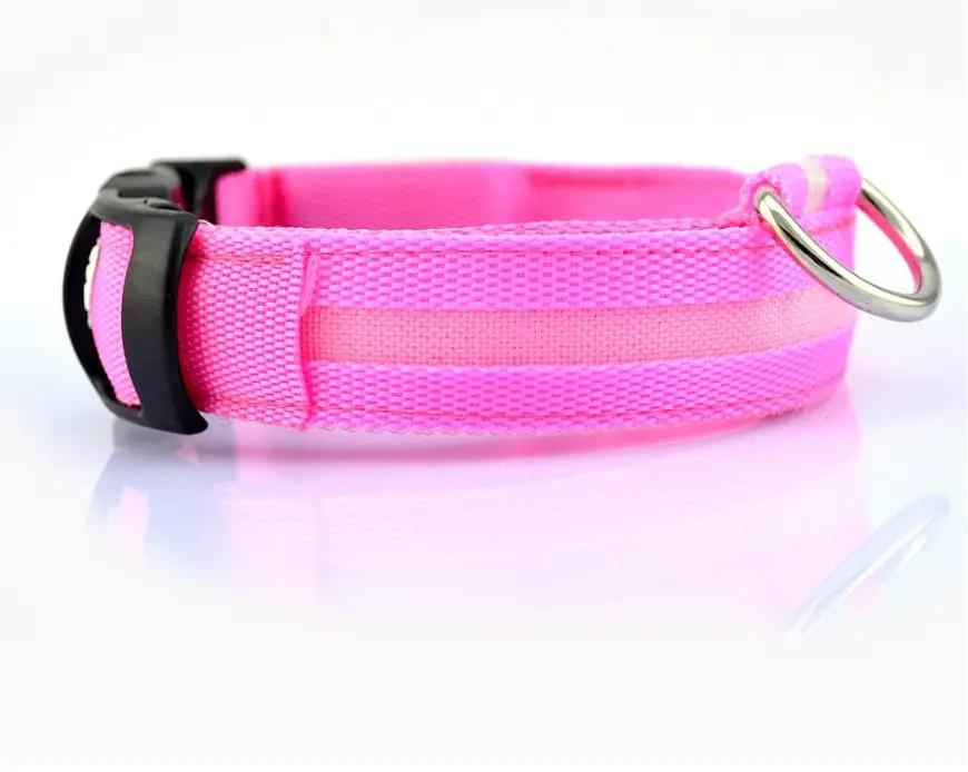 Nylon LED dog collar in pink with adjustable strap, black buckle and metal D-ring