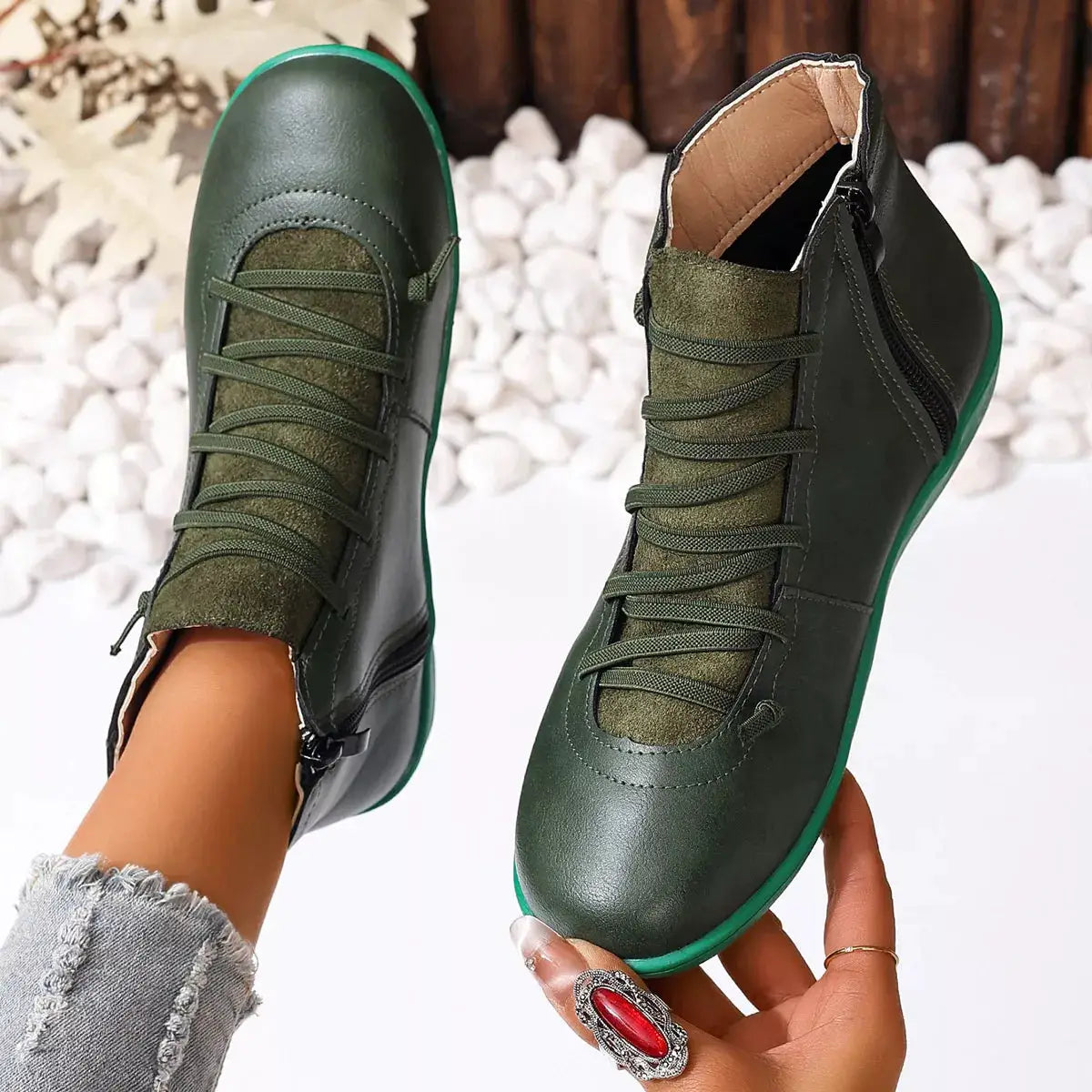 Pair of lace-up faux-leather ankle boots in green with a side zipper