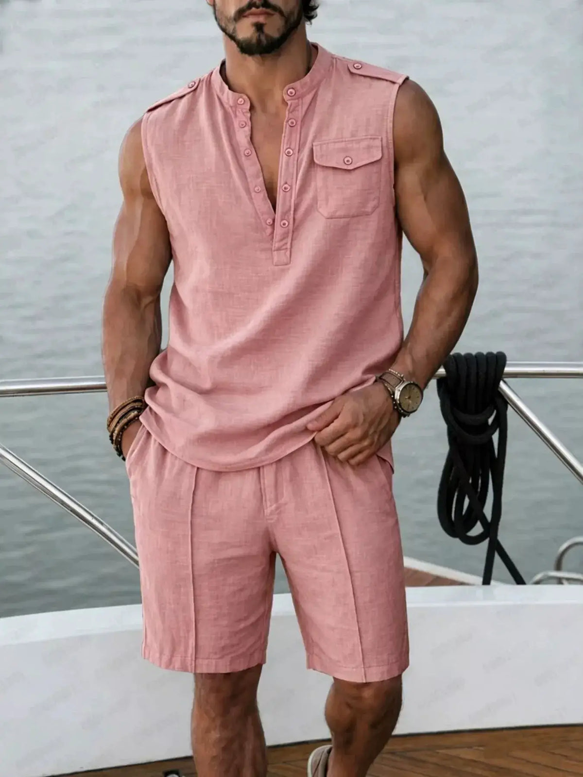 Plus size men's sleeveless top and shorts two-piece set in pink.