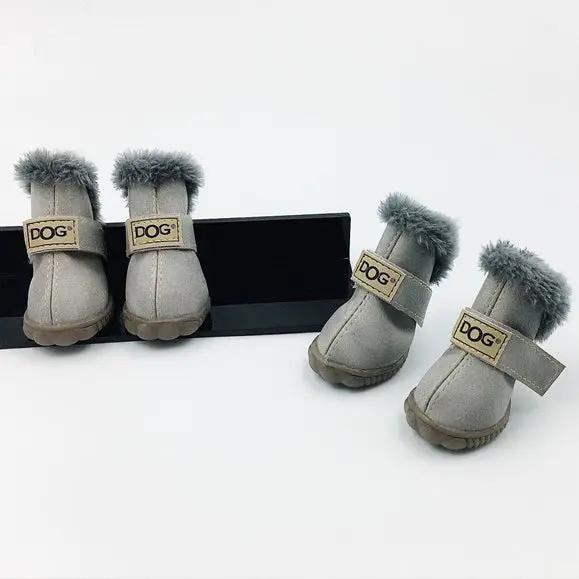 Dog thick snow boots in gray with faux fur trim, four boots shown