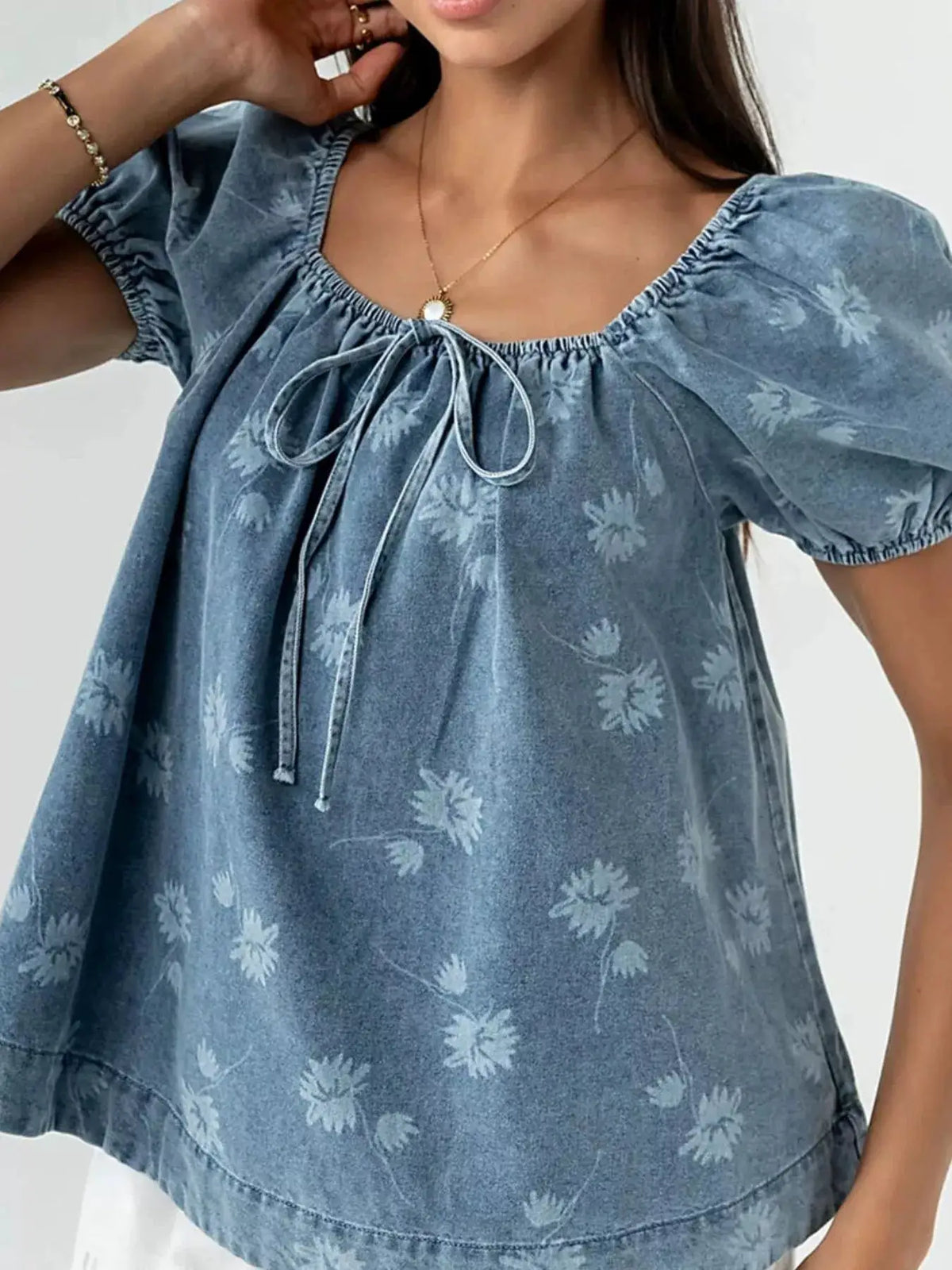 Women's denim cotton-blend top with blue floral print, puff sleeves and tie neckline
