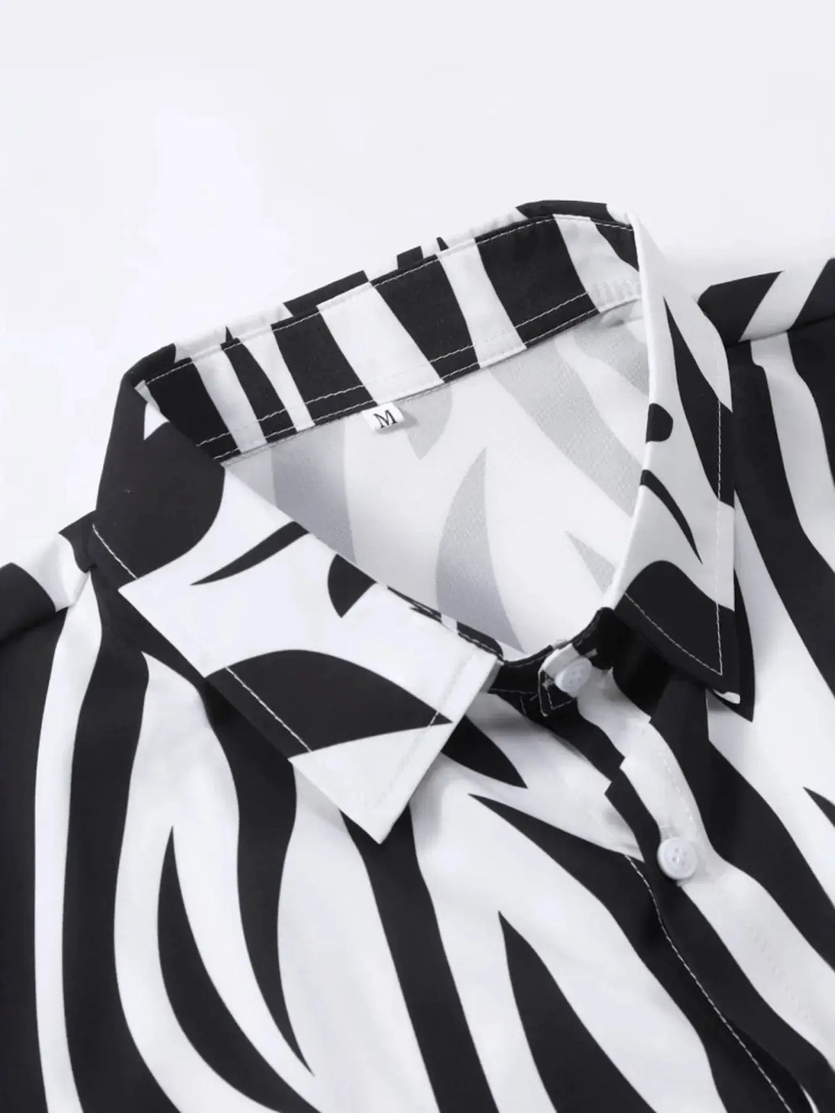 Mens zebra print two-piece set: short-sleeve shirt and shorts by Trendsi, black and white pattern, easy-wear ensemble