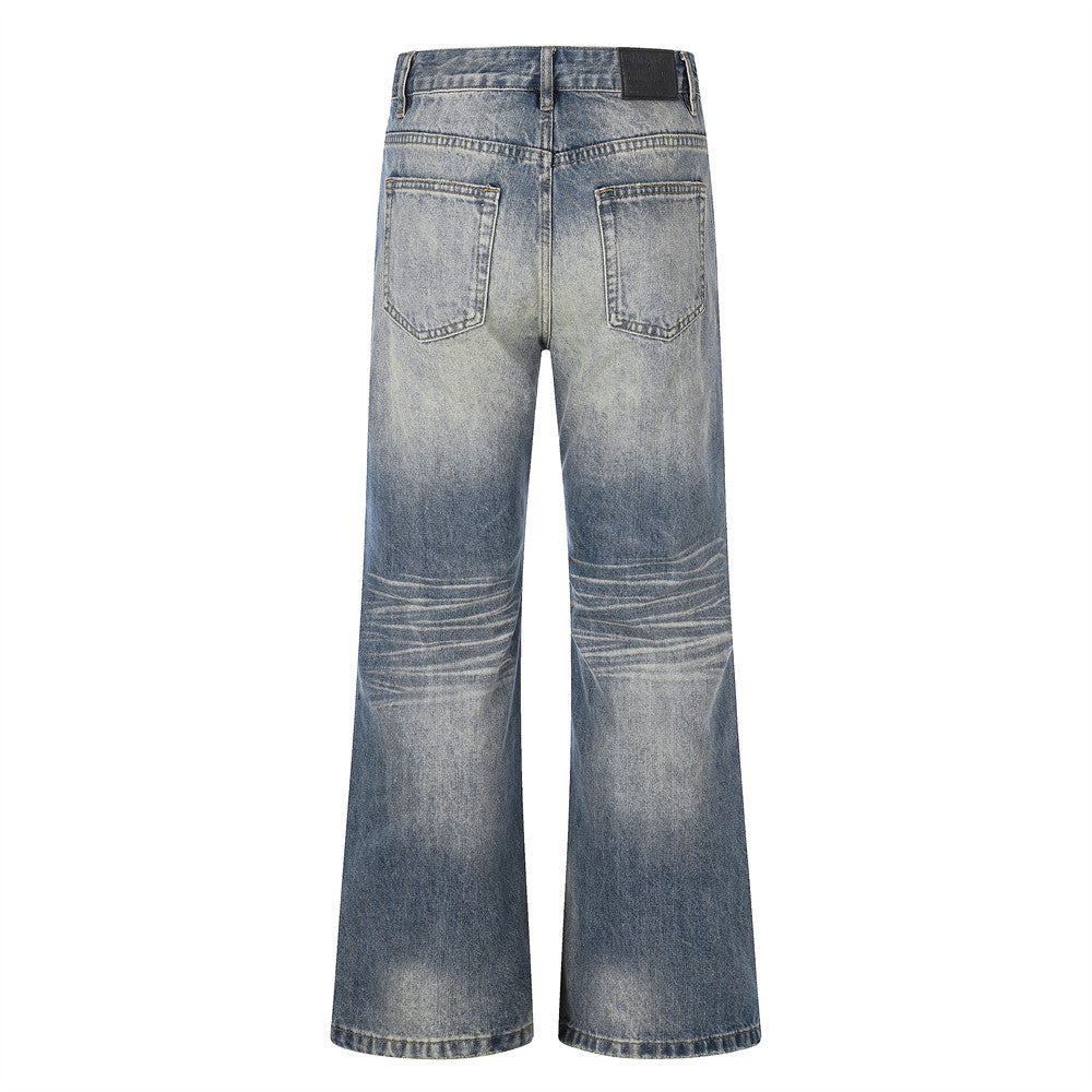 Whitewashed ripped denim jeans by eprolo with faded knee distress and back pockets.