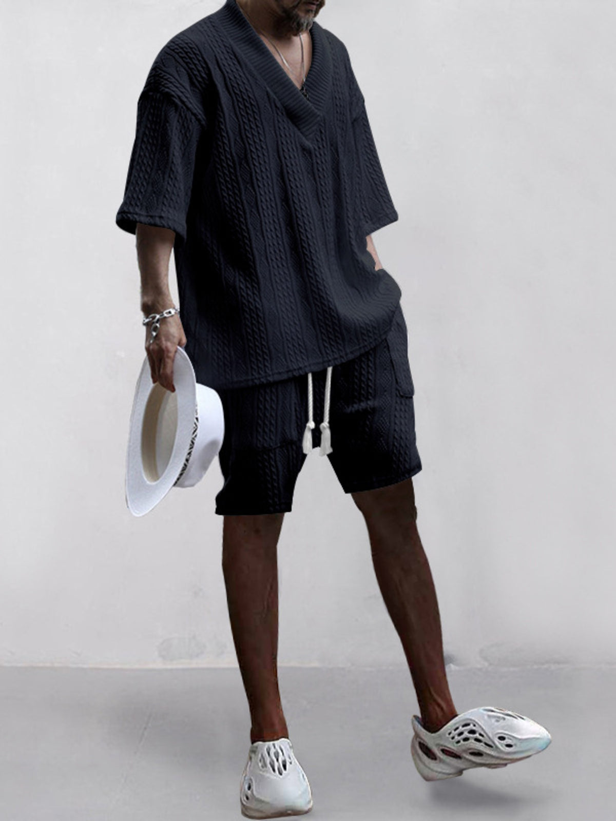 Trendsi men's 2-piece knit v-neck top and shorts set in black; textured fabric, plus size