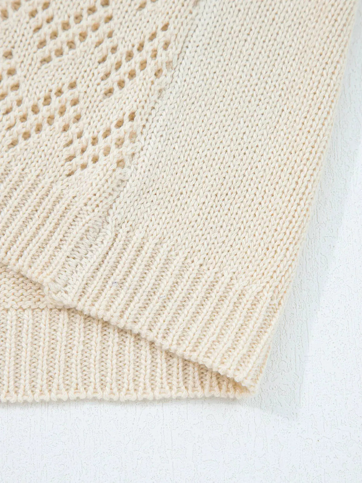 Trendsi hollowed knit open-front cardigan in cream with side pockets and ribbed hem