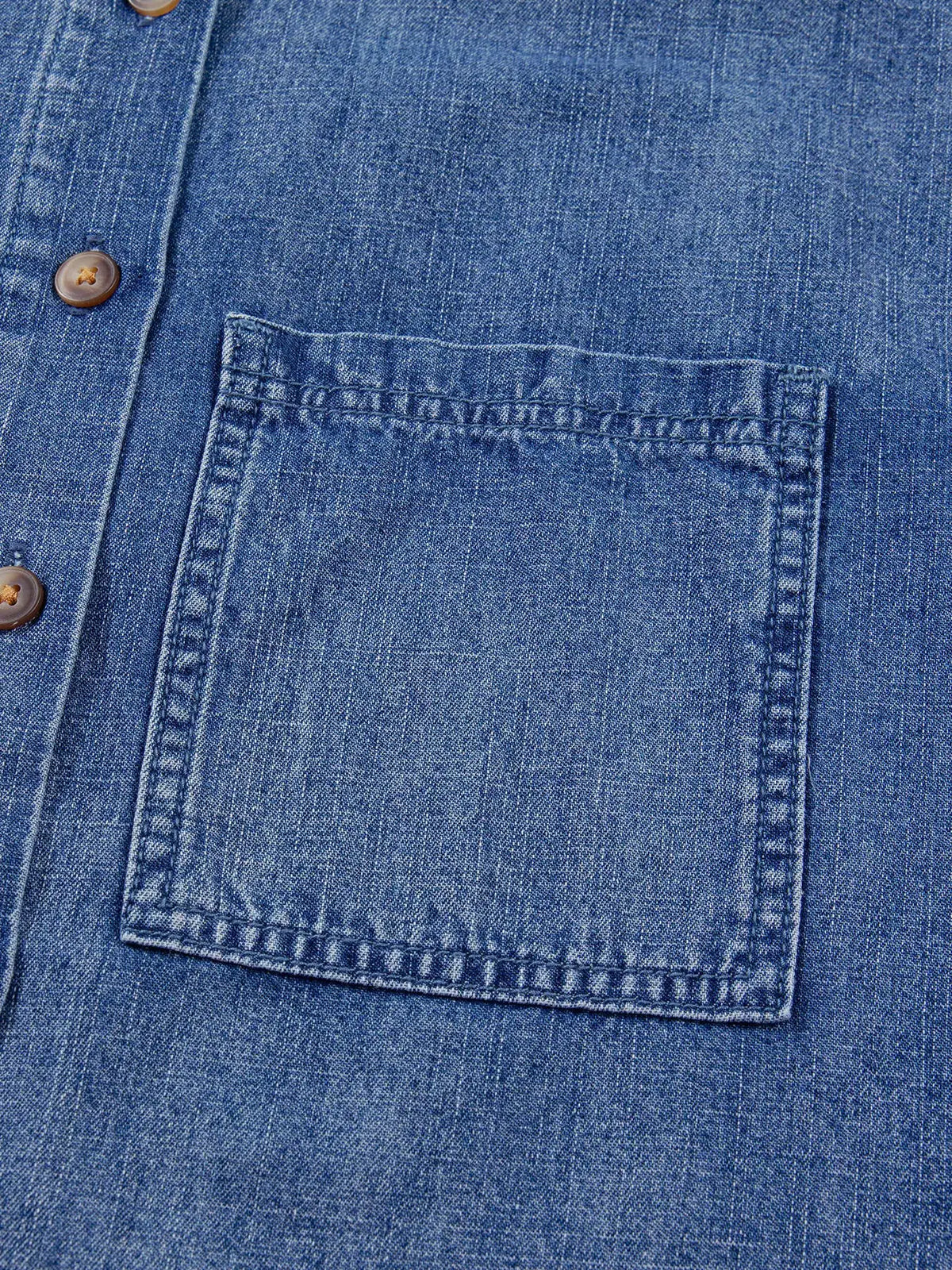 Relaxed denim shirt with three-quarter sleeves and double front pockets in blue denim by Trendsi