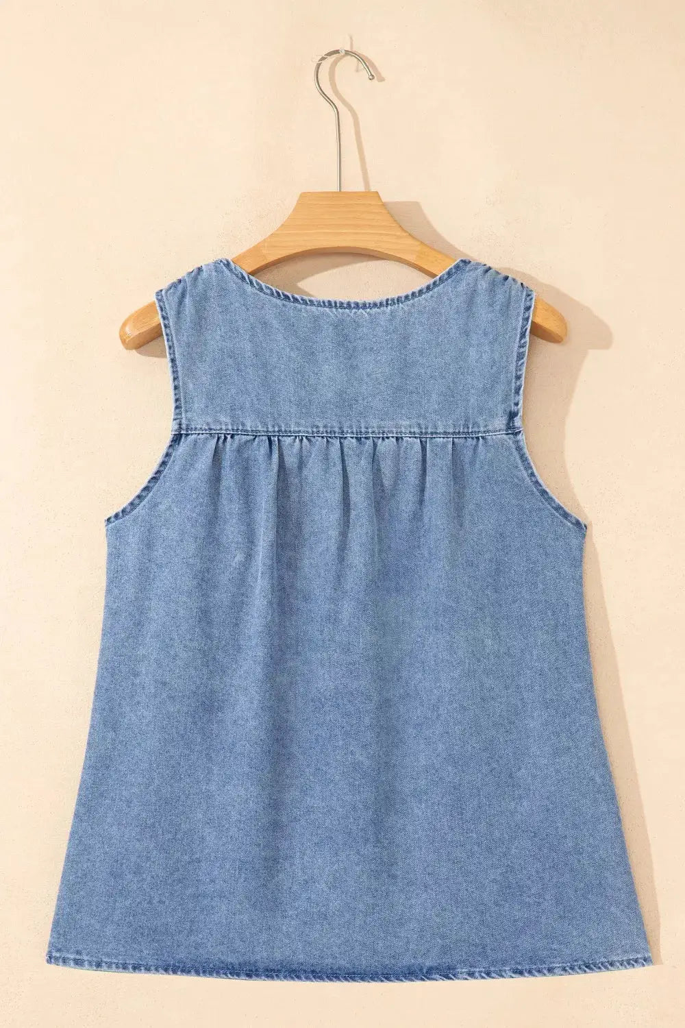 Women denim sleeveless top with pleated back yoke in light blue