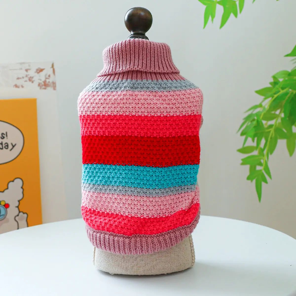 Pet striped knit sweater by AdTec with pink, red and blue bands and turtleneck collar