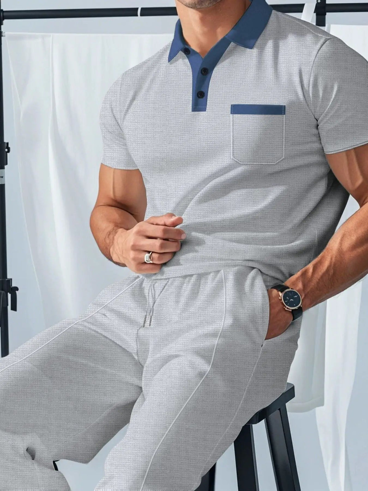 Men's 2-piece polo and pants set plus size by Trendsi in light gray with blue collar and pocket trim.