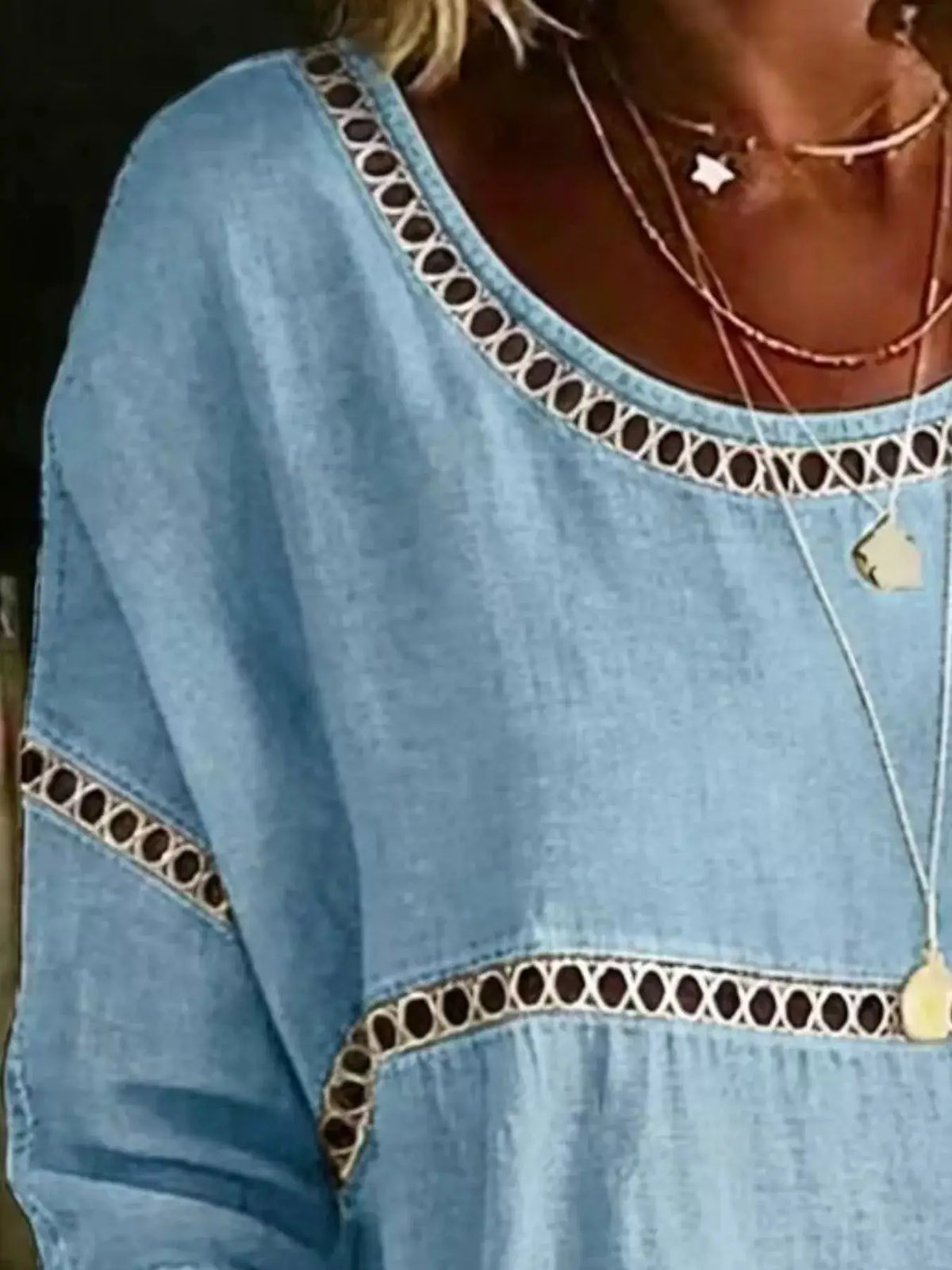 Plus-size light-blue hollow-out round-neck top with white lattice trim.
