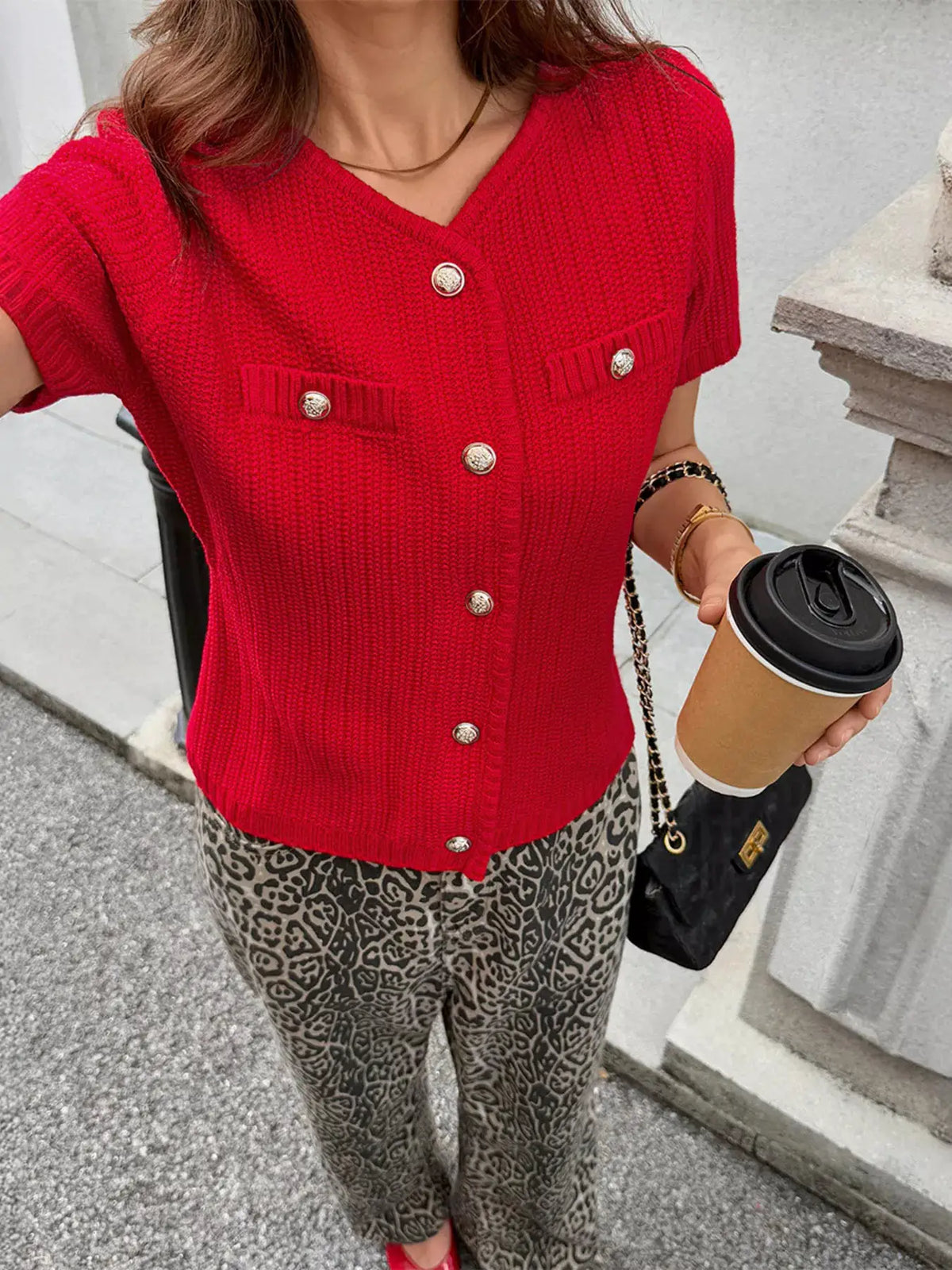 Red button-down short-sleeve cardigan by Trendsi; acrylic-blend knit, gold-tone buttons, two chest pockets.