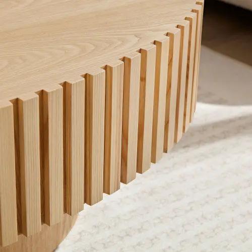 Modern handmade drum coffee table in natural wood with vertical slat sides