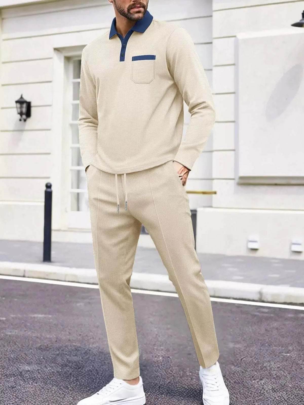 Mens long sleeve beige knit two-piece set with navy collar and pocket trim
