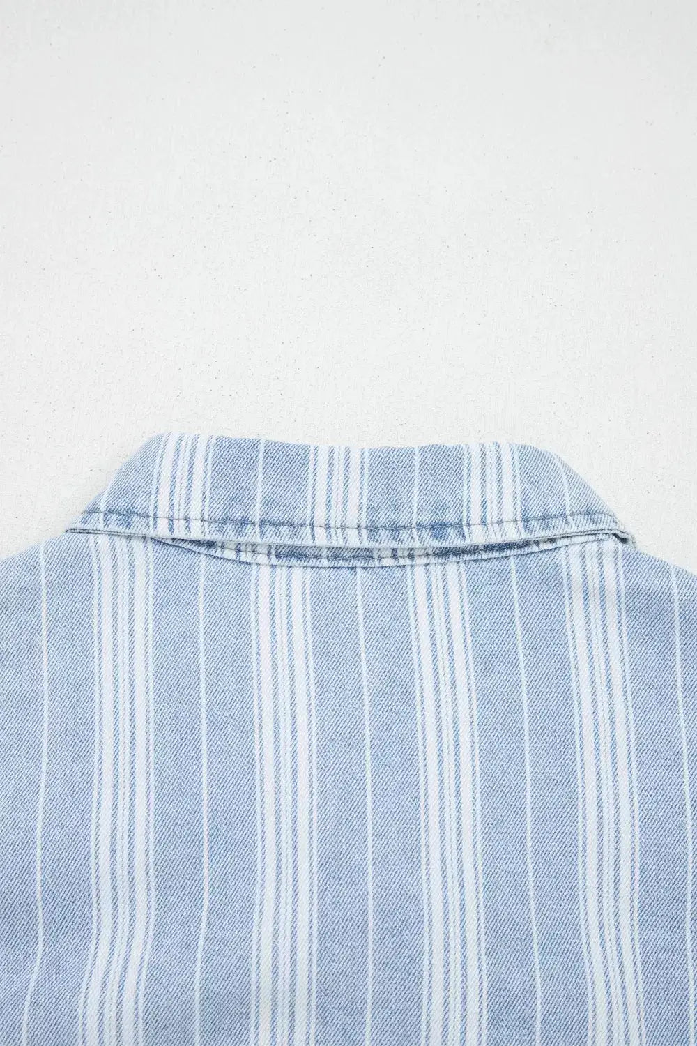 Striped boyfriend denim shacket in light blue with white vertical stripes