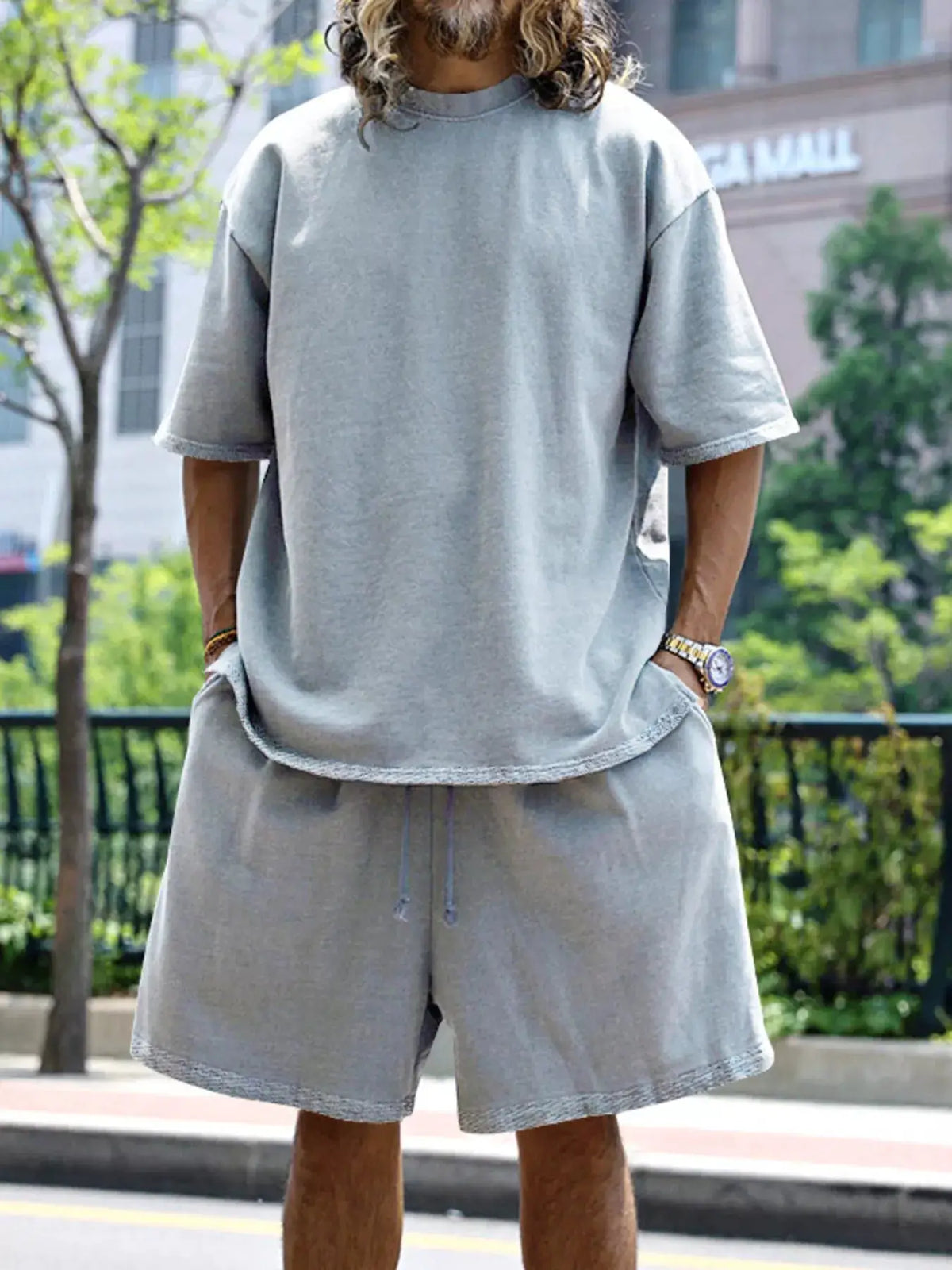 Men's full-size relaxed-fit gray T-shirt and shorts set with pockets by Trendsi
