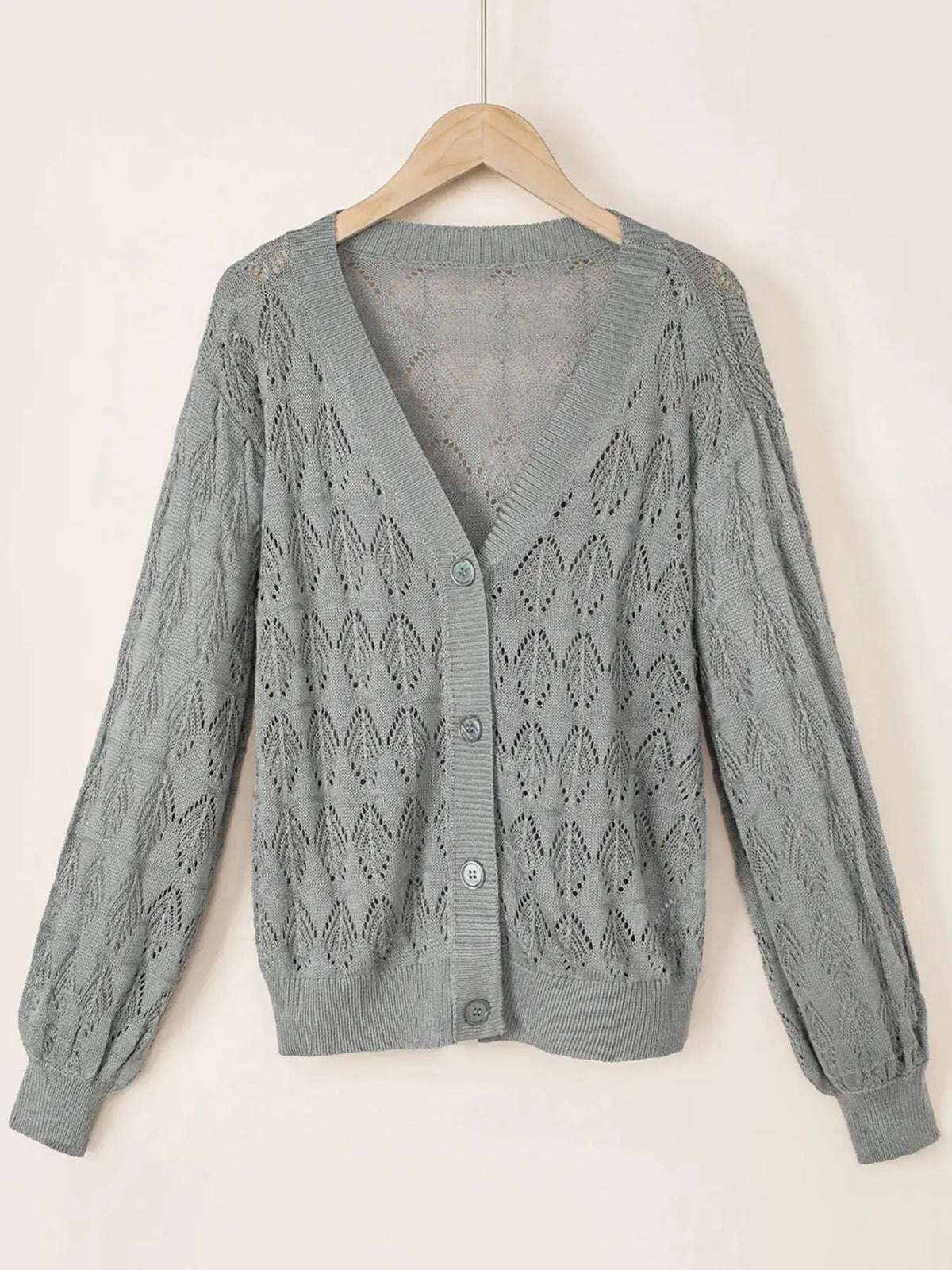 Button-front openwork cardigan in gray knit with textured stretch details