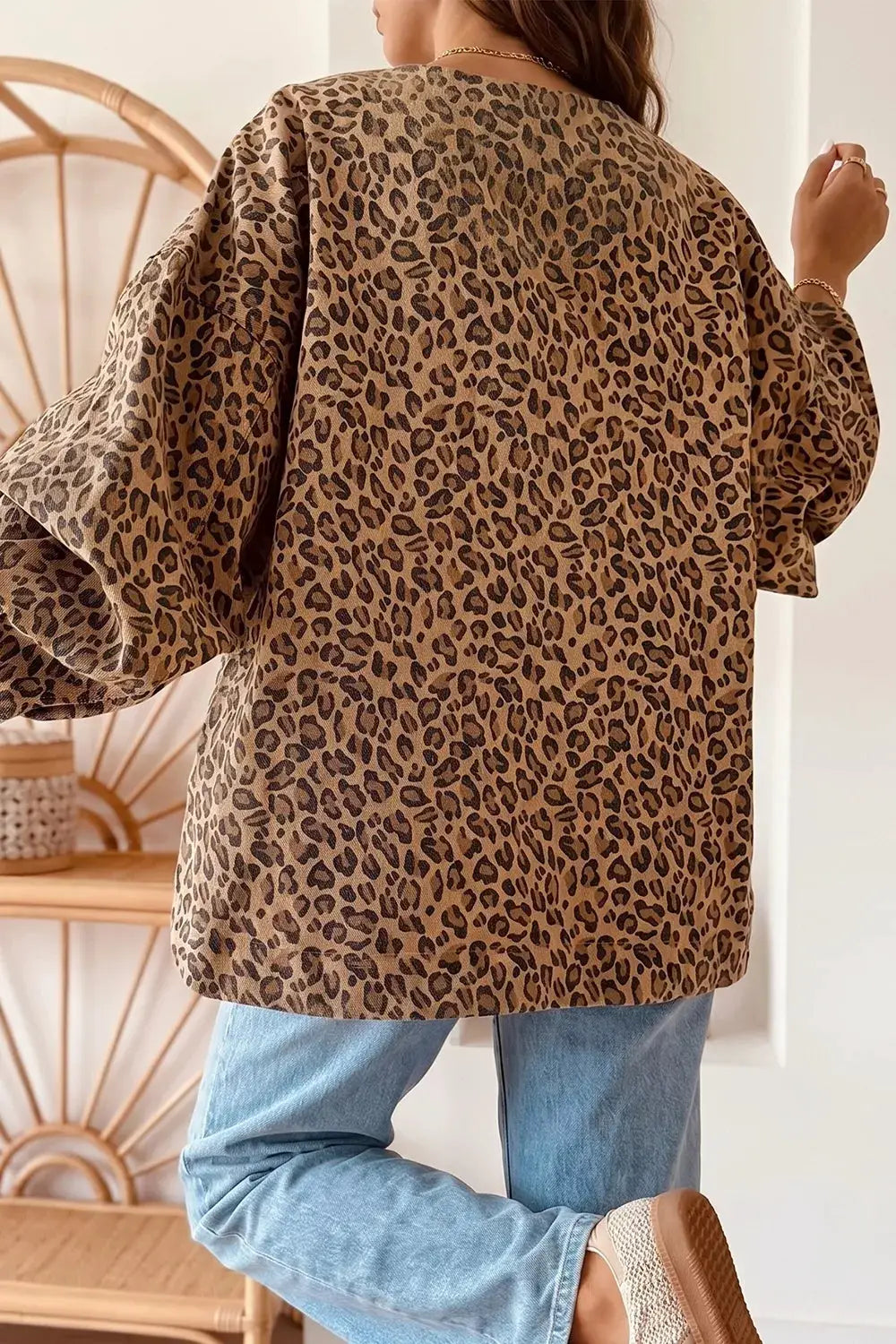 Casual leopard print denim trucker jacket with button front and side pockets