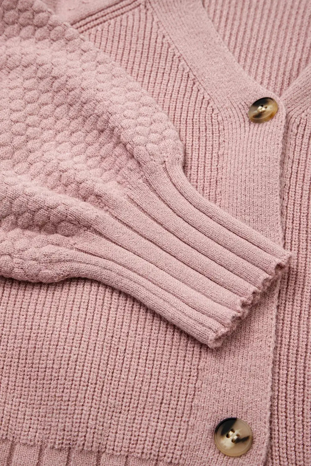 V-Neck Button-Down Cardigan in soft pink knit with ribbed cuffs and textured sleeve detail.