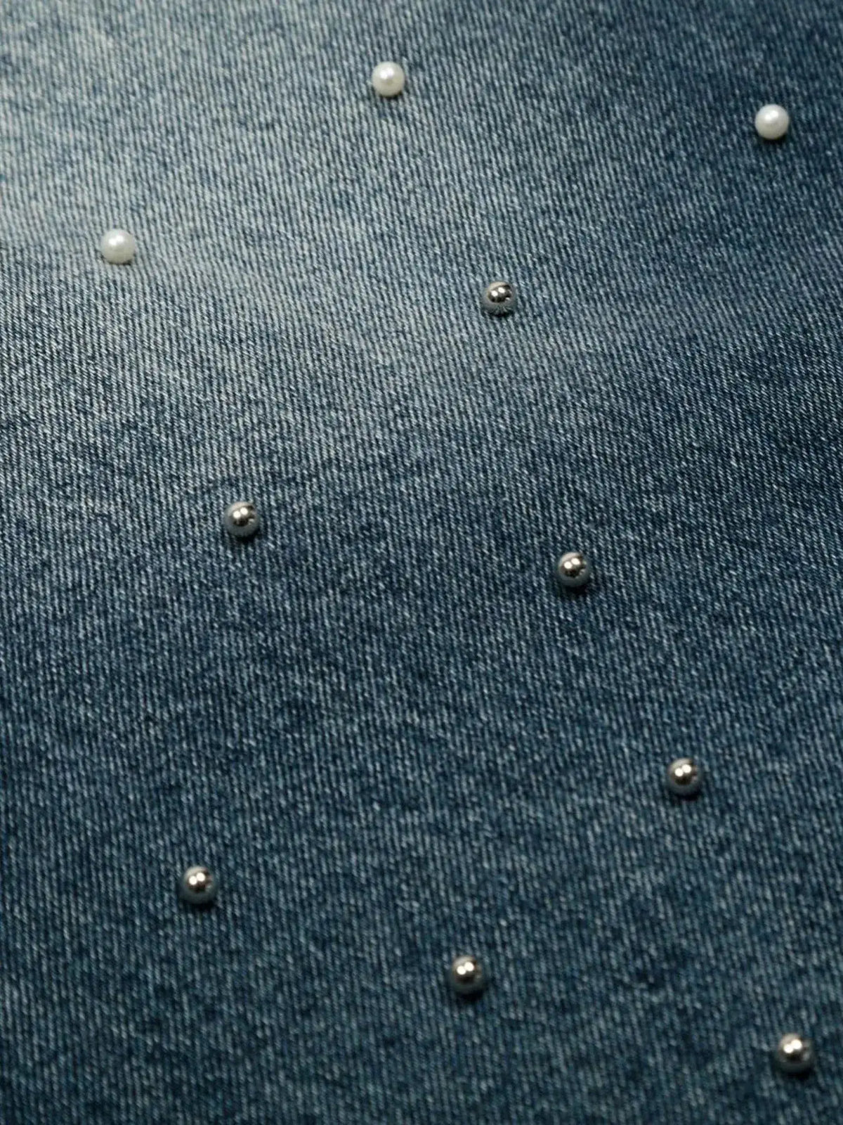 Men's relaxed wide-leg denim shorts in soft washed cotton, blue denim with pearl and silver studs.