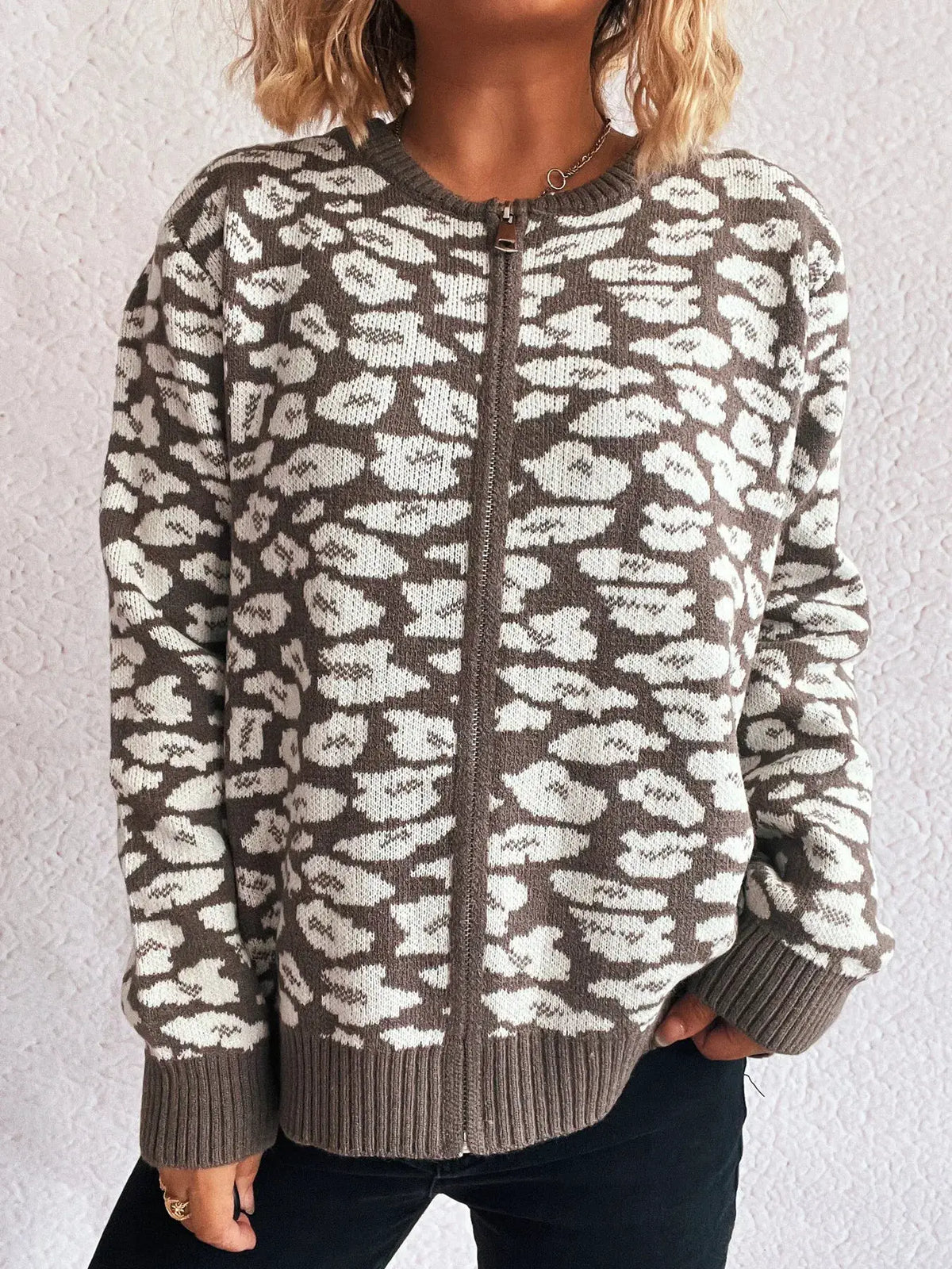 Zip-up cardigan by Trendsi; taupe and ivory animal print, front zip, ribbed cuffs and hem, long sleeves.